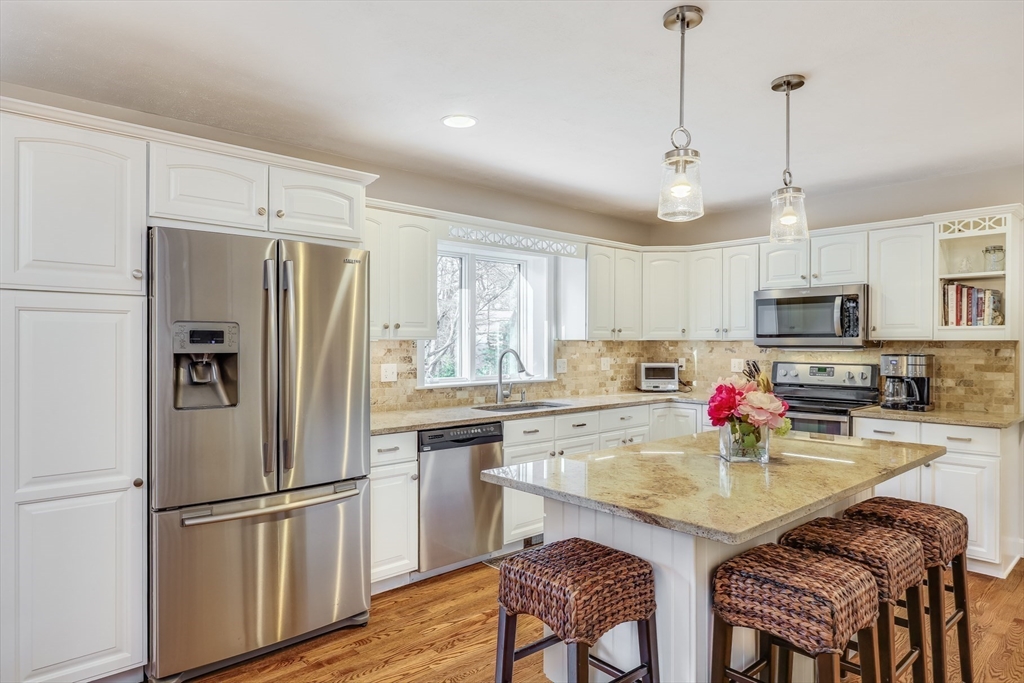 2 Briar Patch Circle Sandwich, MA 02537 - Photo 10 of 42 a kitchen with refrigerator a stove two couches and chairs