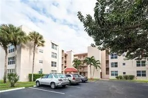 a view of a street in front of a building