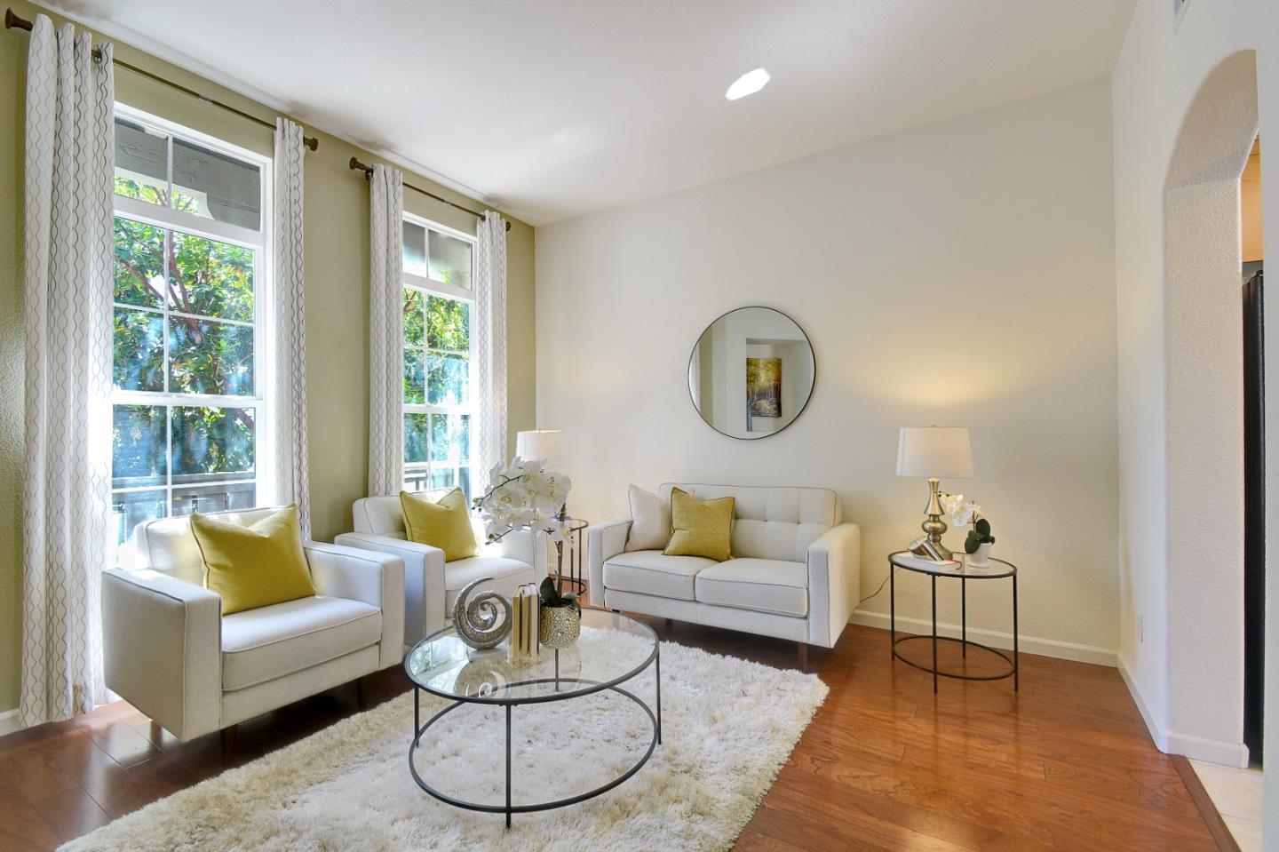 842 Wind Walk Milpitas, CA 95035 - Photo 1 of 45 a living room with furniture and a large window