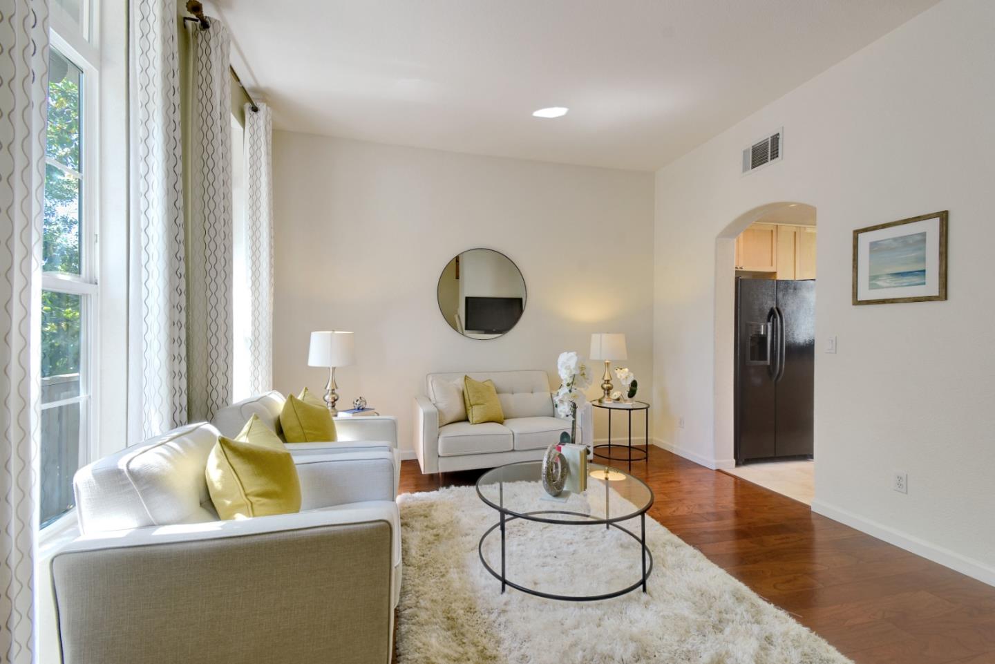 842 Wind Walk Milpitas, CA 95035 - Photo 2 of 45 a living room with furniture and a wooden floor