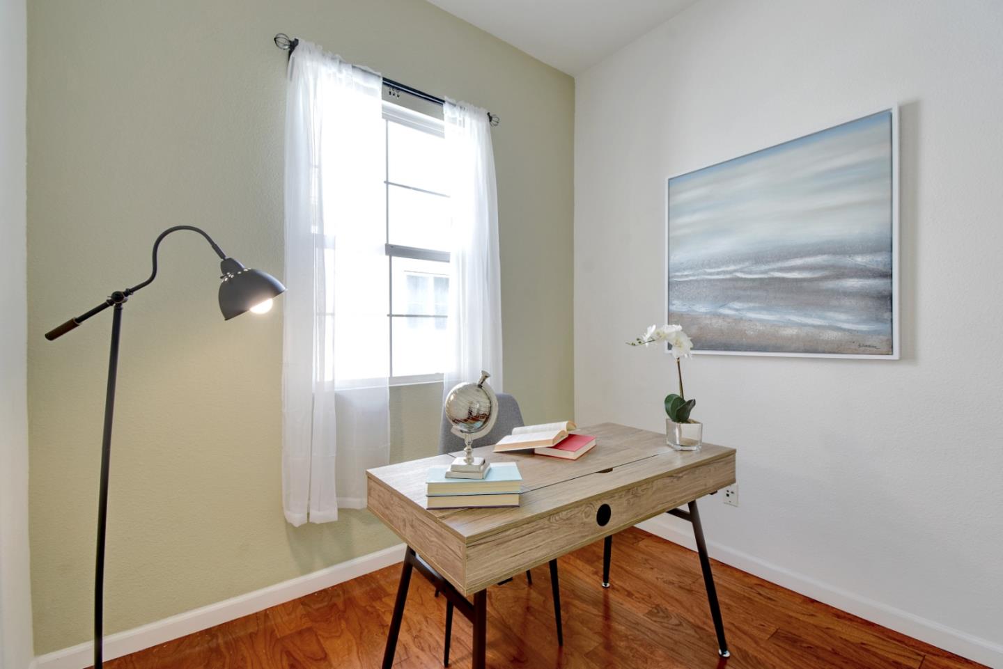 842 Wind Walk Milpitas, CA 95035 - Photo 15 of 45 a view of a room that has a table and a dresser in it