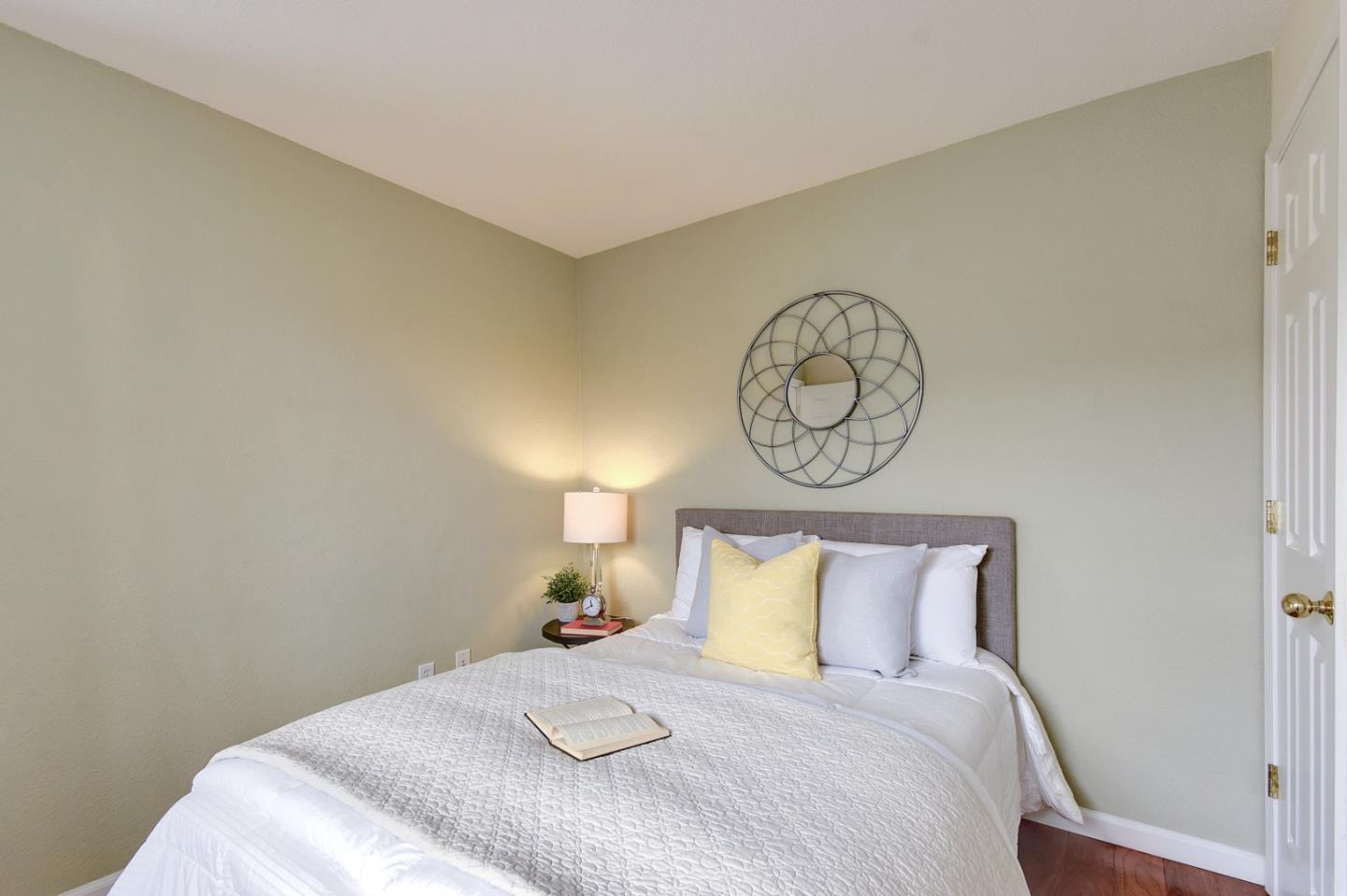 842 Wind Walk Milpitas, CA 95035 - Photo 24 of 45 a bedroom with a bed and a closet