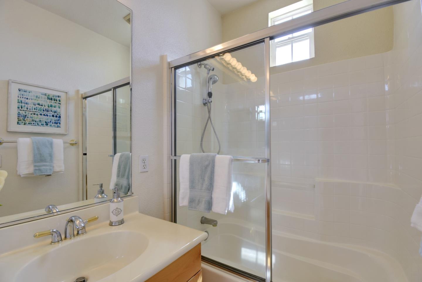 842 Wind Walk Milpitas, CA 95035 - Photo 28 of 45 a bathroom with a sink and a mirror