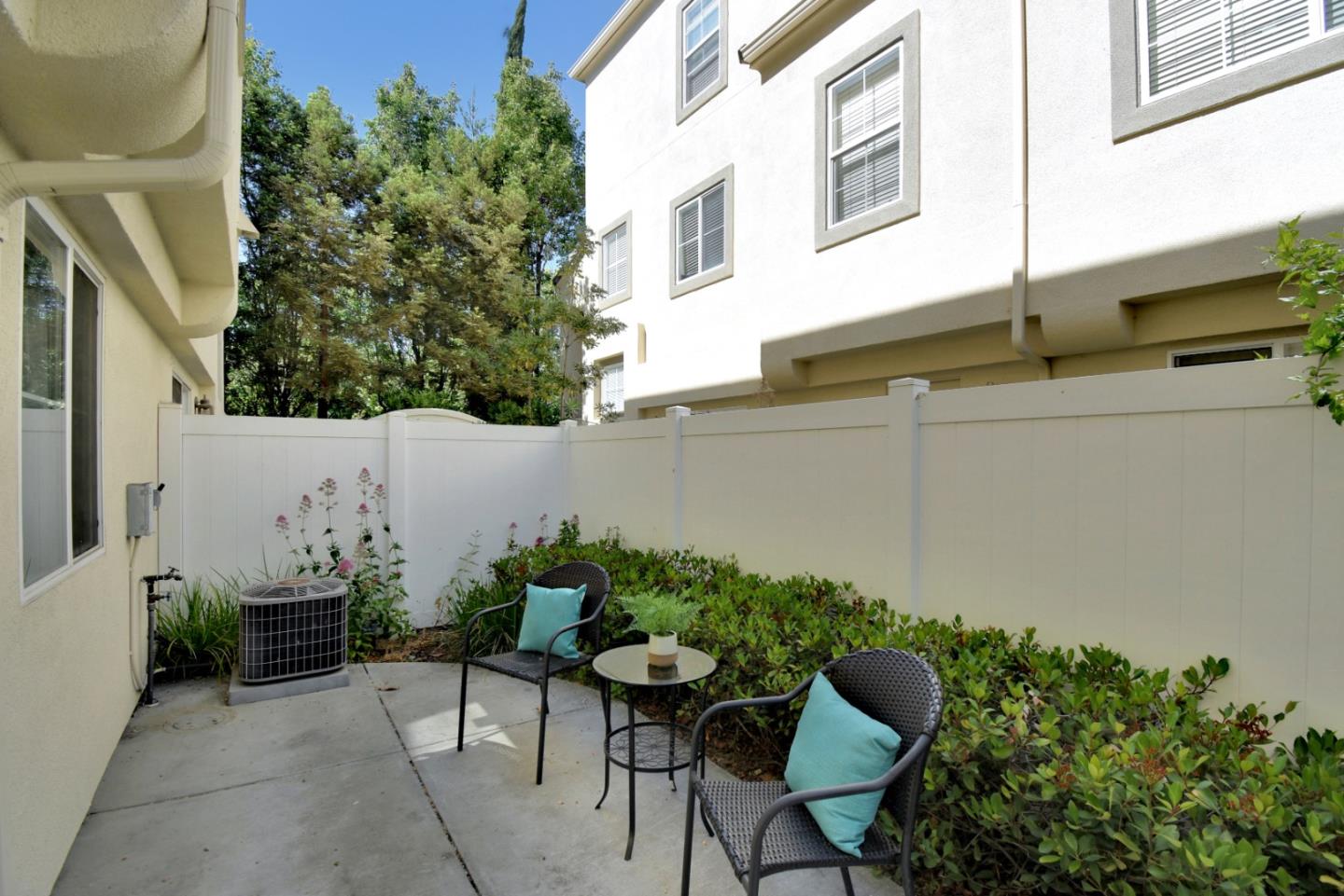842 Wind Walk Milpitas, CA 95035 - Photo 32 of 45 a backyard of a house with table and chairs