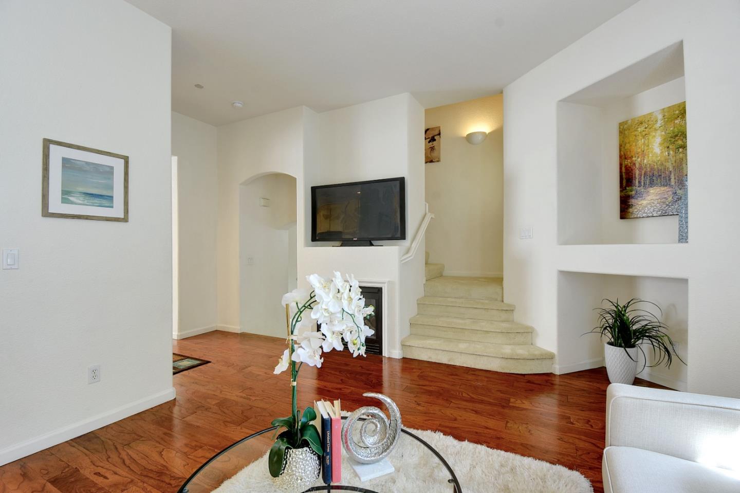 842 Wind Walk Milpitas, CA 95035 - Photo 5 of 45 a living room with furniture and a flat screen tv