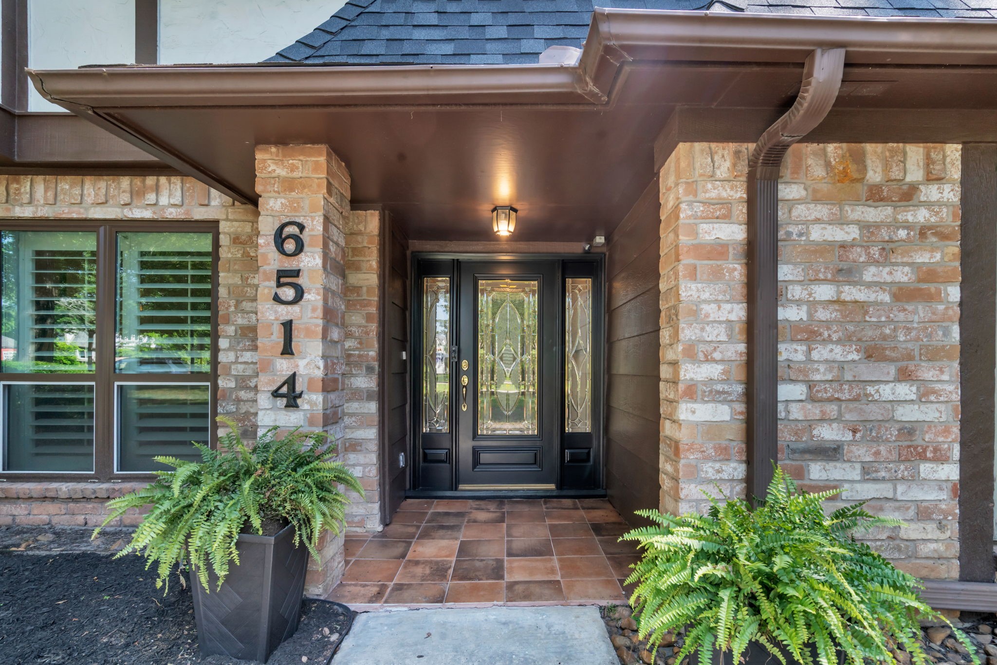 6514 Larkmount Drive Spring, TX 77389 - Photo 2 of 41 The welcoming front door sets the tone for this homes warm and inviting interior.