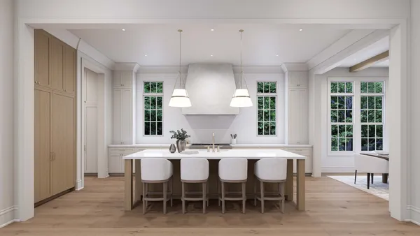 a kitchen with a dining table chairs and sink