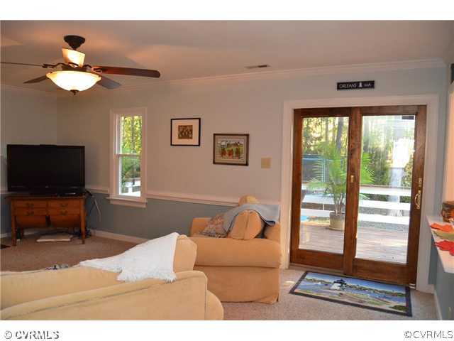 13802 Turtle Hill Road Midlothian, VA 23112 - Photo 6 of 12 a living room with furniture and a flat screen tv