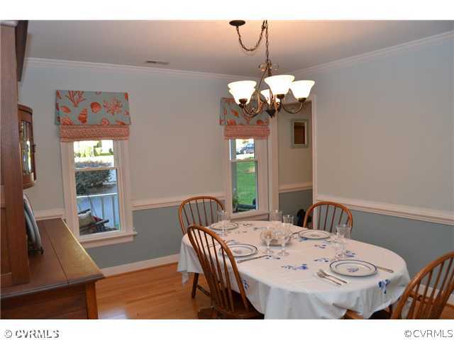 13802 Turtle Hill Road Midlothian, VA 23112 - Photo 8 of 12 a view of a dining room with furniture window and wooden floor