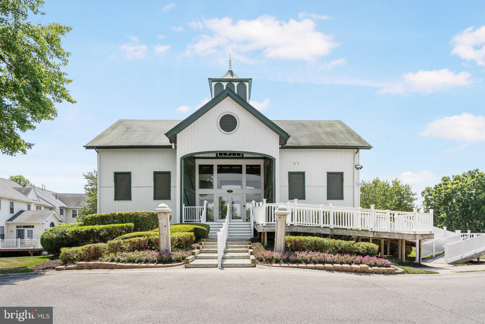 8941 Griffin Way, Unit 8941 Baltimore, MD 21208 - Photo 45 of 49 a front view of a house with garage