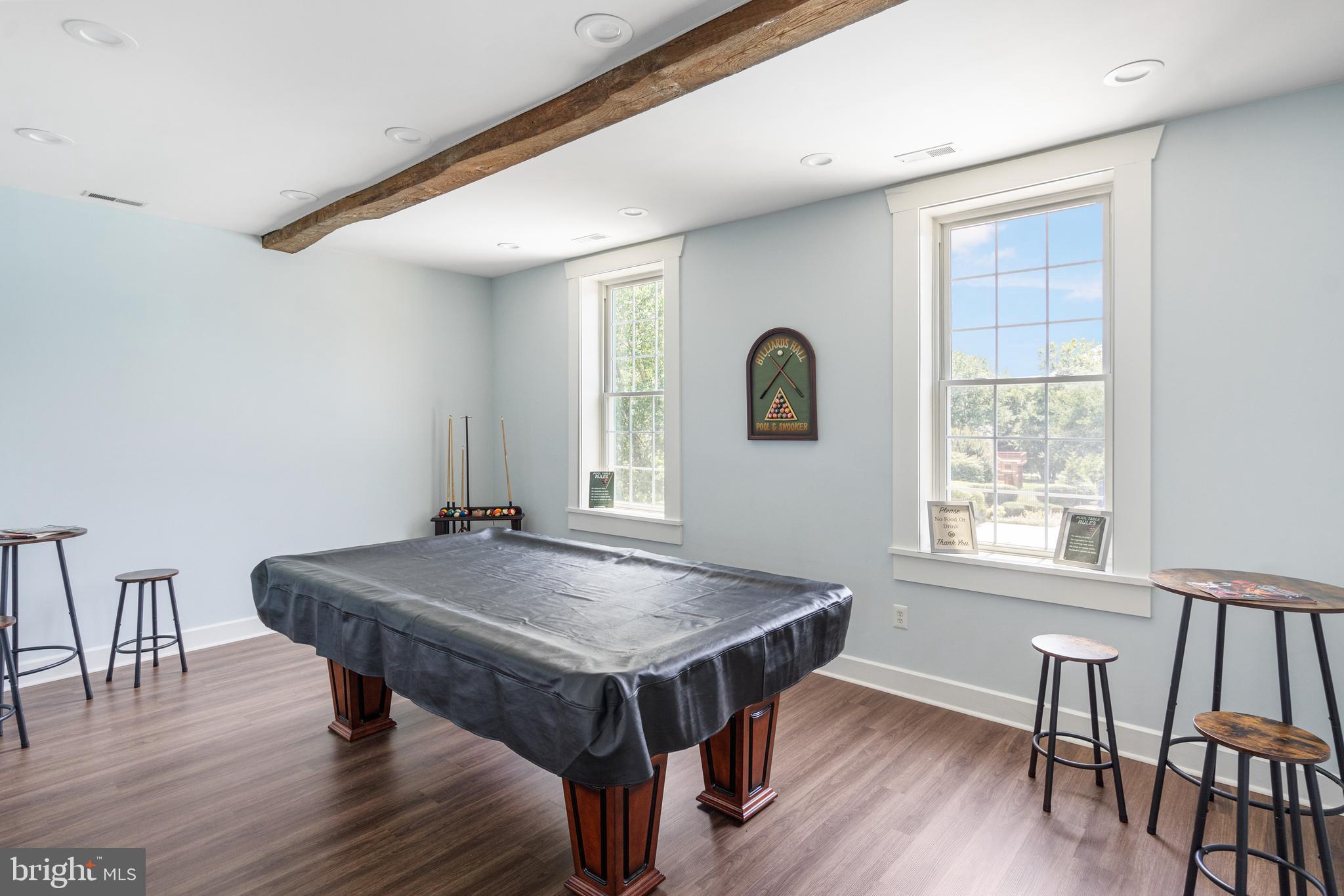 8941 Griffin Way, Unit 8941 Baltimore, MD 21208 - Photo 46 of 49 a view of a dining room with furniture window and wooden floor