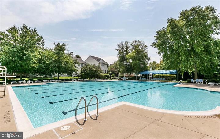 8941 Griffin Way, Unit 8941 Baltimore, MD 21208 - Photo 48 of 49 a view of a swimming pool with a yard