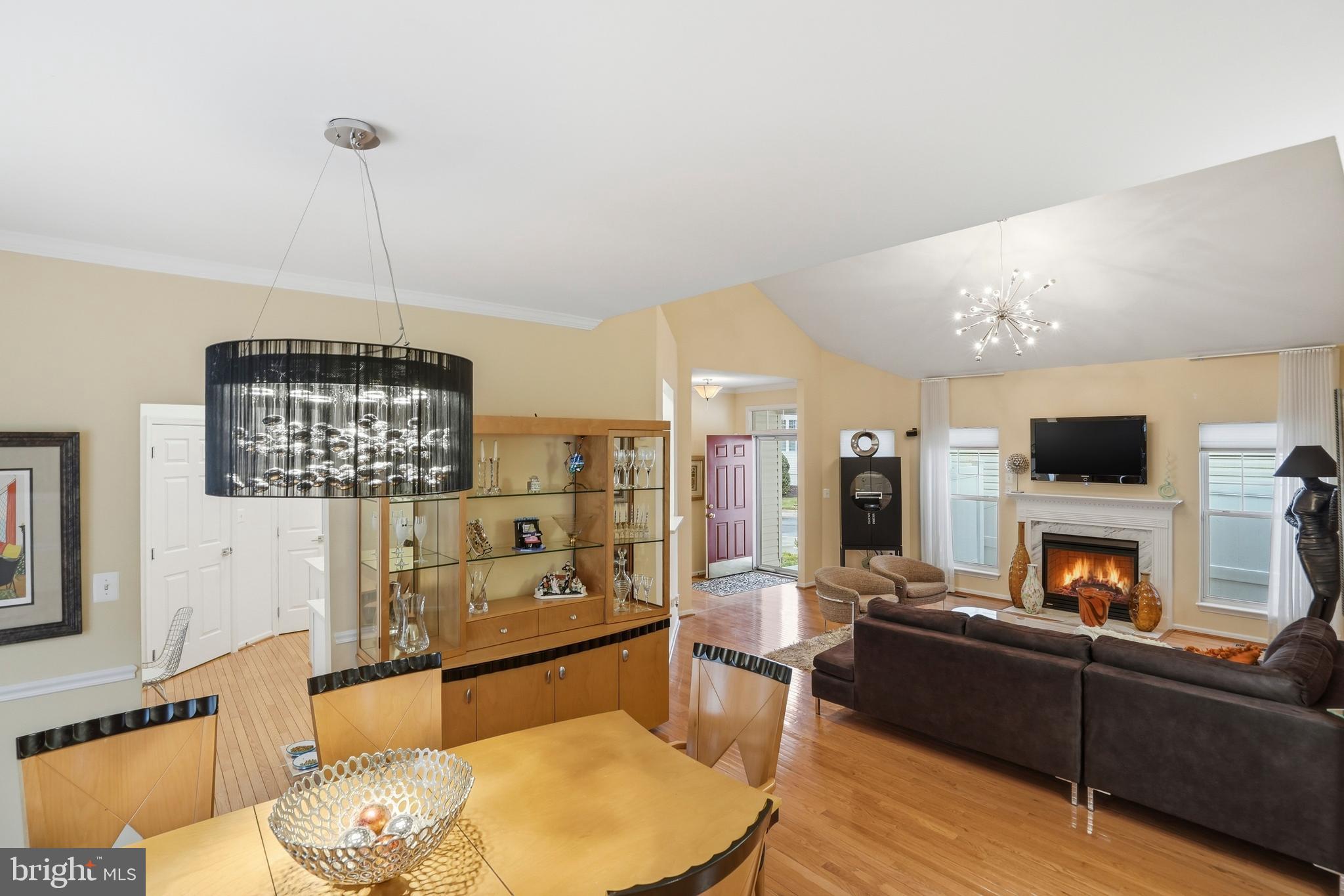 8941 Griffin Way, Unit 8941 Baltimore, MD 21208 - Photo 8 of 49 a living room with furniture and a flat screen tv