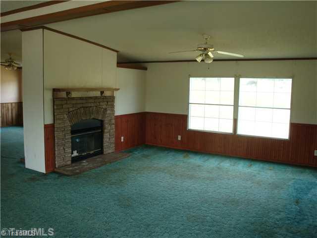 2450 Charlie Cooper Road Staley, NC 27355 - Photo 4 of 5 Living Room.