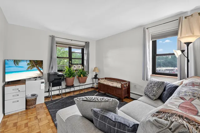 a balcony with table and chairs