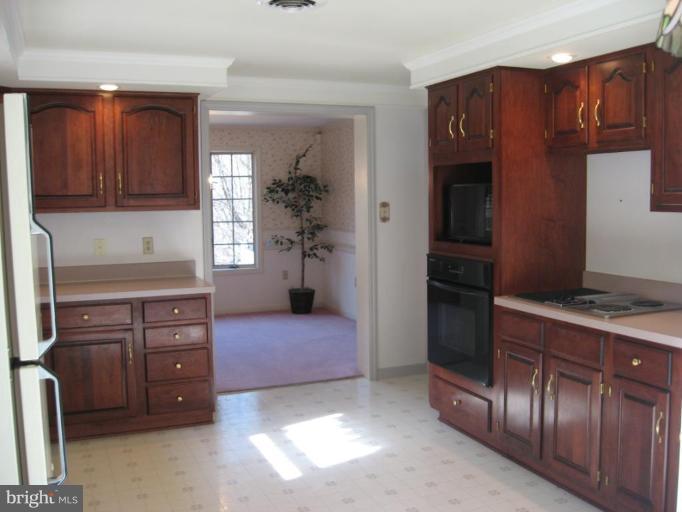 11533 Wolfsville Road Smithsburg, MD 21783 - Photo 4 of 15 Cherry Cabinets in the spacious Kitchen!
