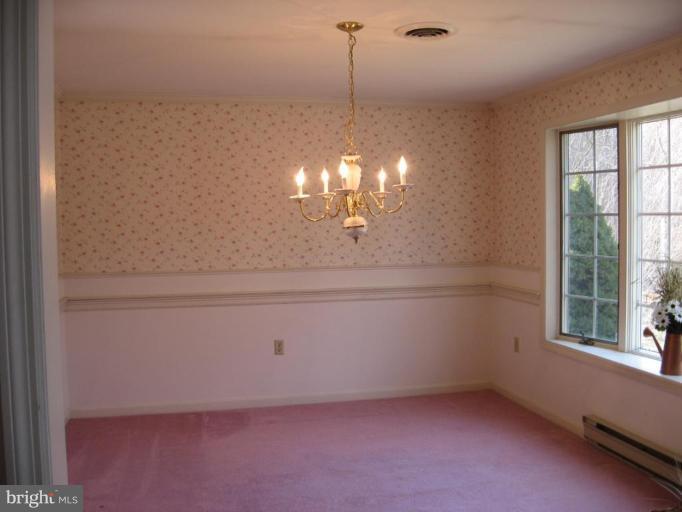 11533 Wolfsville Road Smithsburg, MD 21783 - Photo 9 of 15 Chandelier and Bay Window in the Dining Room