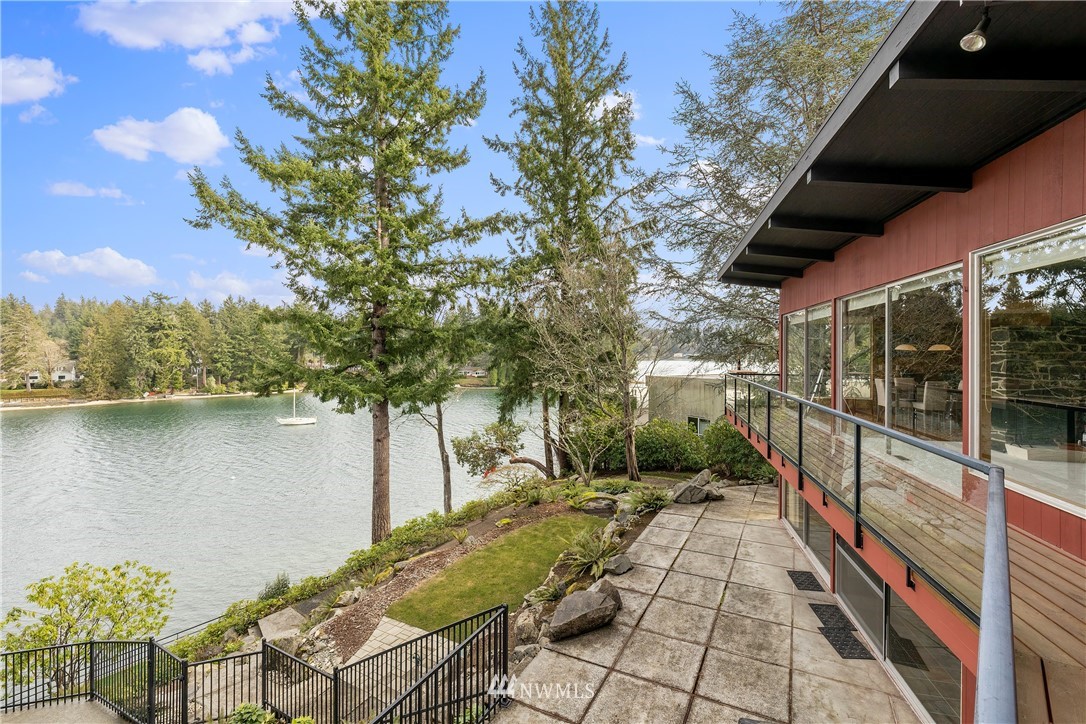 a view of a balcony with chairs