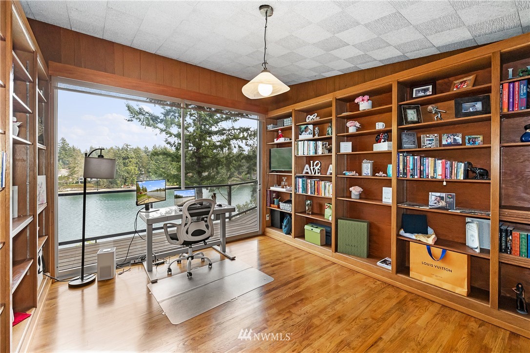 1600 Madrona Point Bremerton, WA 98312 - Photo 12 of 40 a view of a work space with furniture and floor to ceiling window