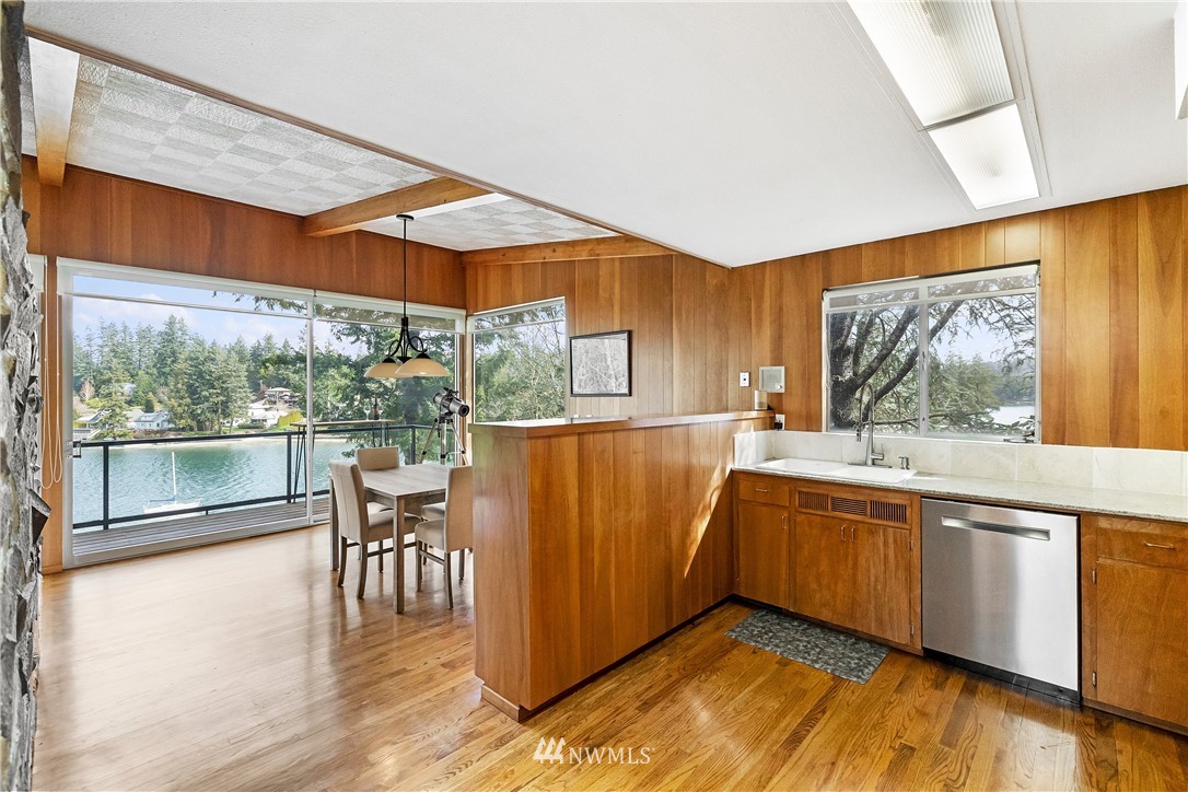 1600 Madrona Point Bremerton, WA 98312 - Photo 14 of 40 a view of a kitchen with wooden floor and a sink