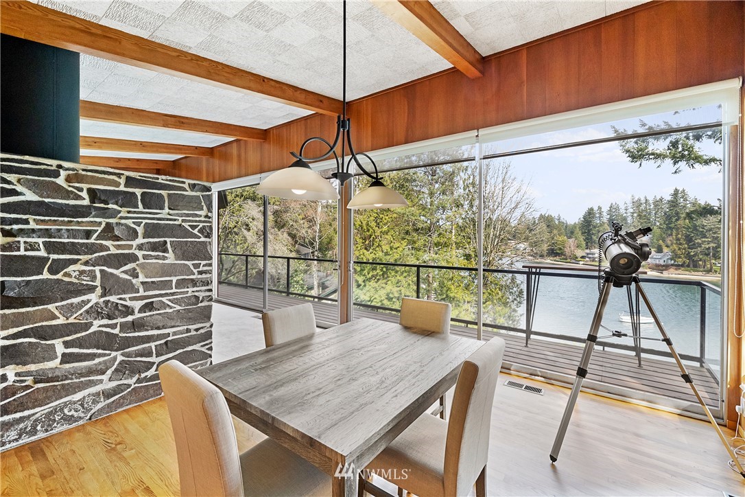 1600 Madrona Point Bremerton, WA 98312 - Photo 15 of 40 a view of balcony with wooden floor and outdoor seating