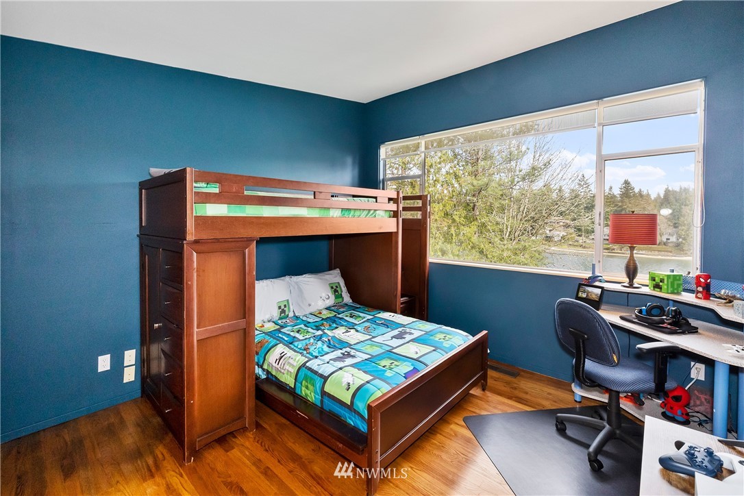 1600 Madrona Point Bremerton, WA 98312 - Photo 17 of 40 a bedroom with a bed and a window