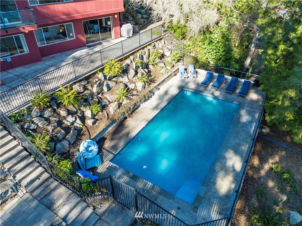 1600 Madrona Point Bremerton, WA 98312 - Photo 21 of 40 a view of a swimming pool with an outdoor seating