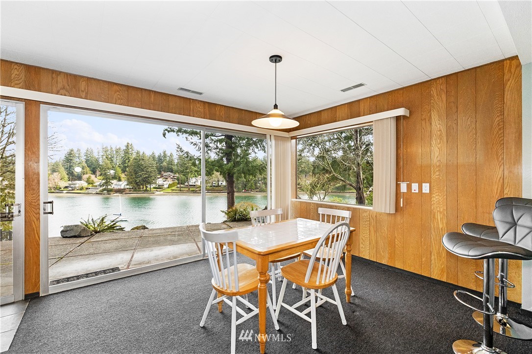 1600 Madrona Point Bremerton, WA 98312 - Photo 23 of 40 a dining room with furniture water table and chairs