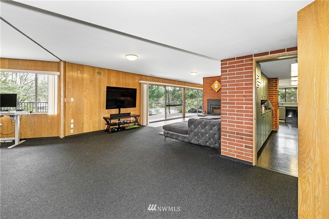 1600 Madrona Point Bremerton, WA 98312 - Photo 28 of 40 a view of room with floor to ceiling window and flat screen tv