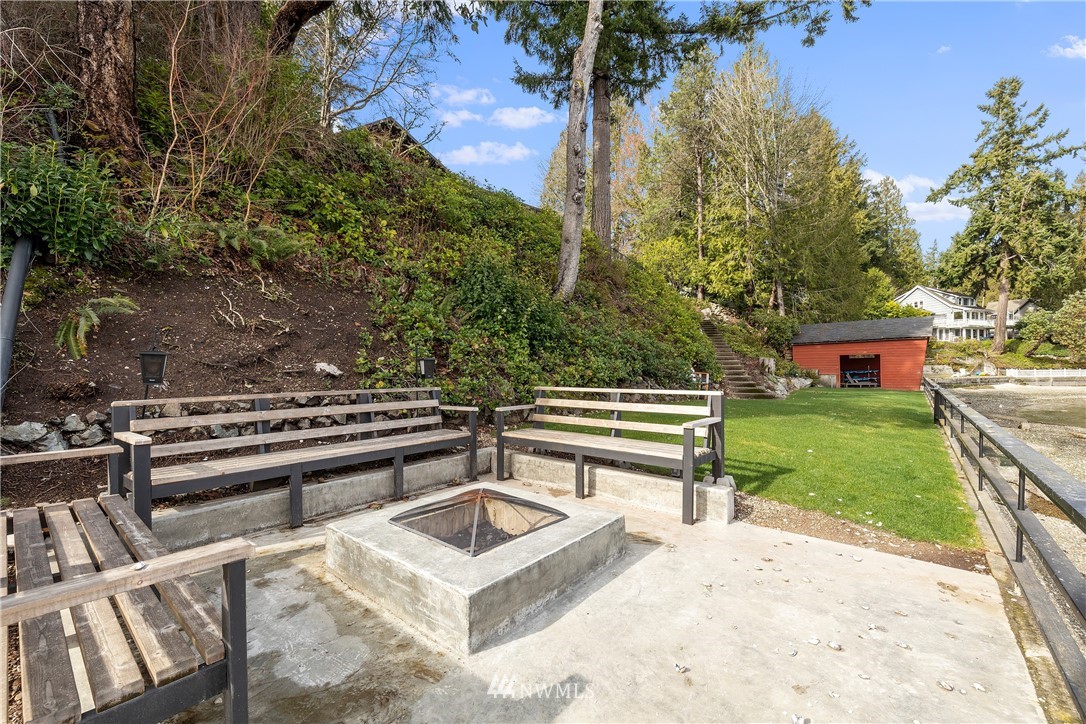 1600 Madrona Point Bremerton, WA 98312 - Photo 37 of 40 a view of a bench in a garden