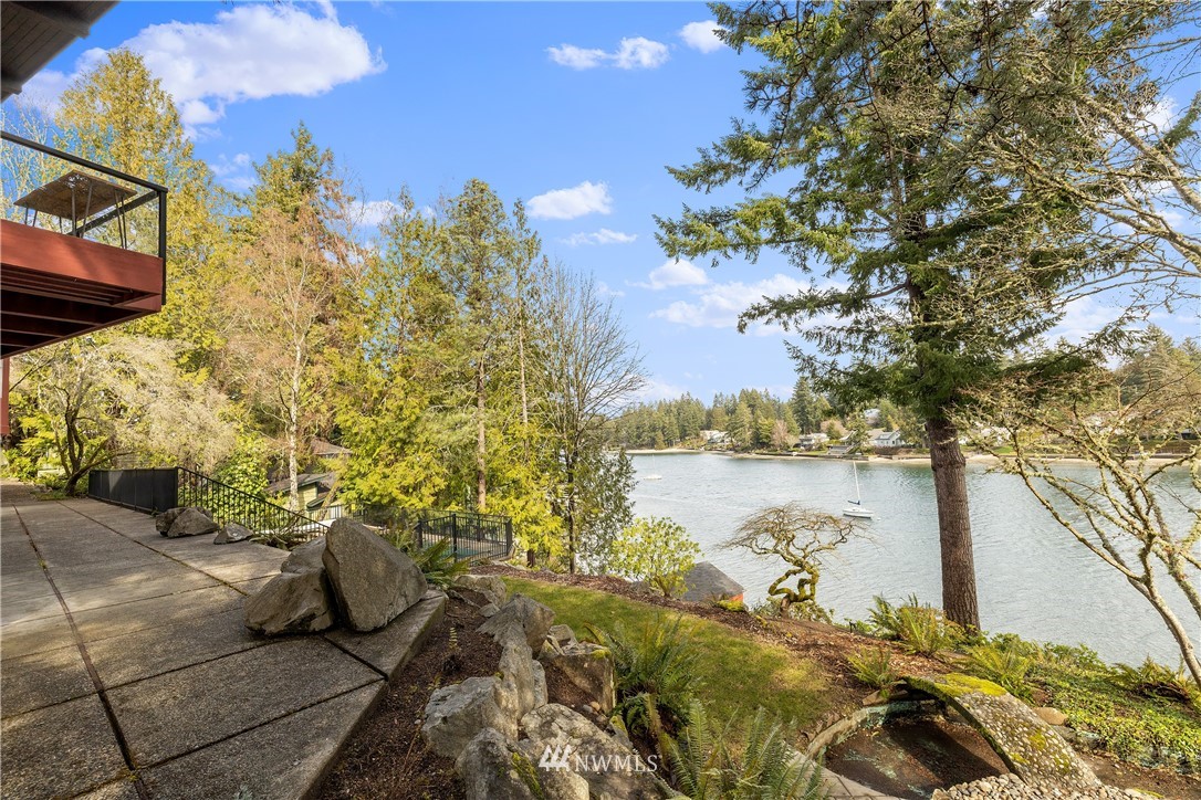 1600 Madrona Point Bremerton, WA 98312 - Photo 7 of 40 a view of a lake from a patio