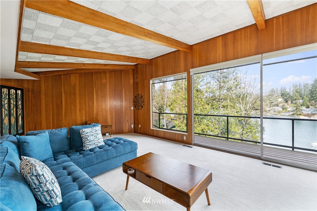 1600 Madrona Point Bremerton, WA 98312 - Photo 9 of 40 a living room with furniture and a large window