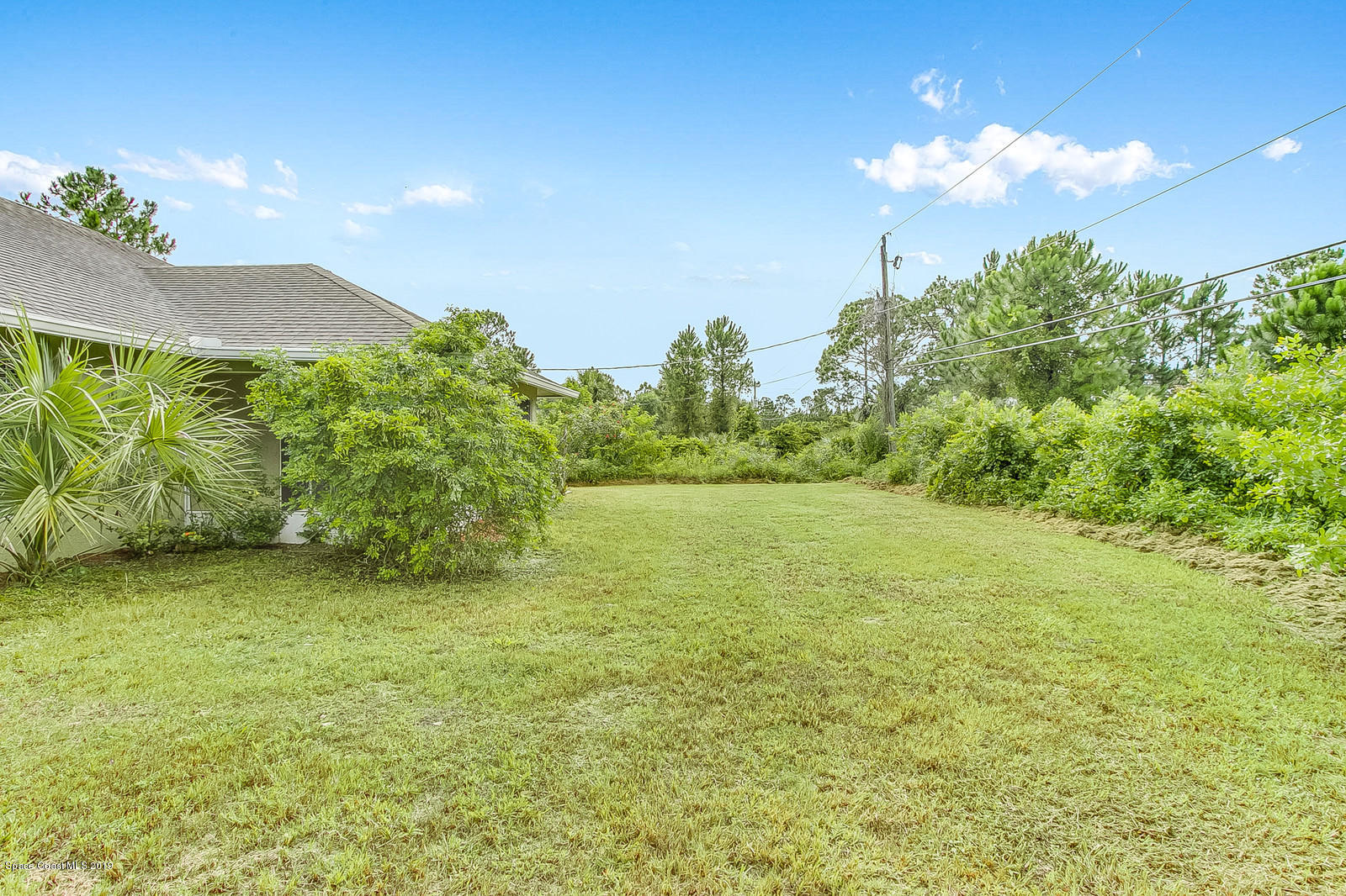 171 Haines Road Southwest Palm Bay, FL 32908 - Photo 26 of 26 Side yard