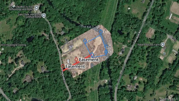 a sign that is in front of flowers