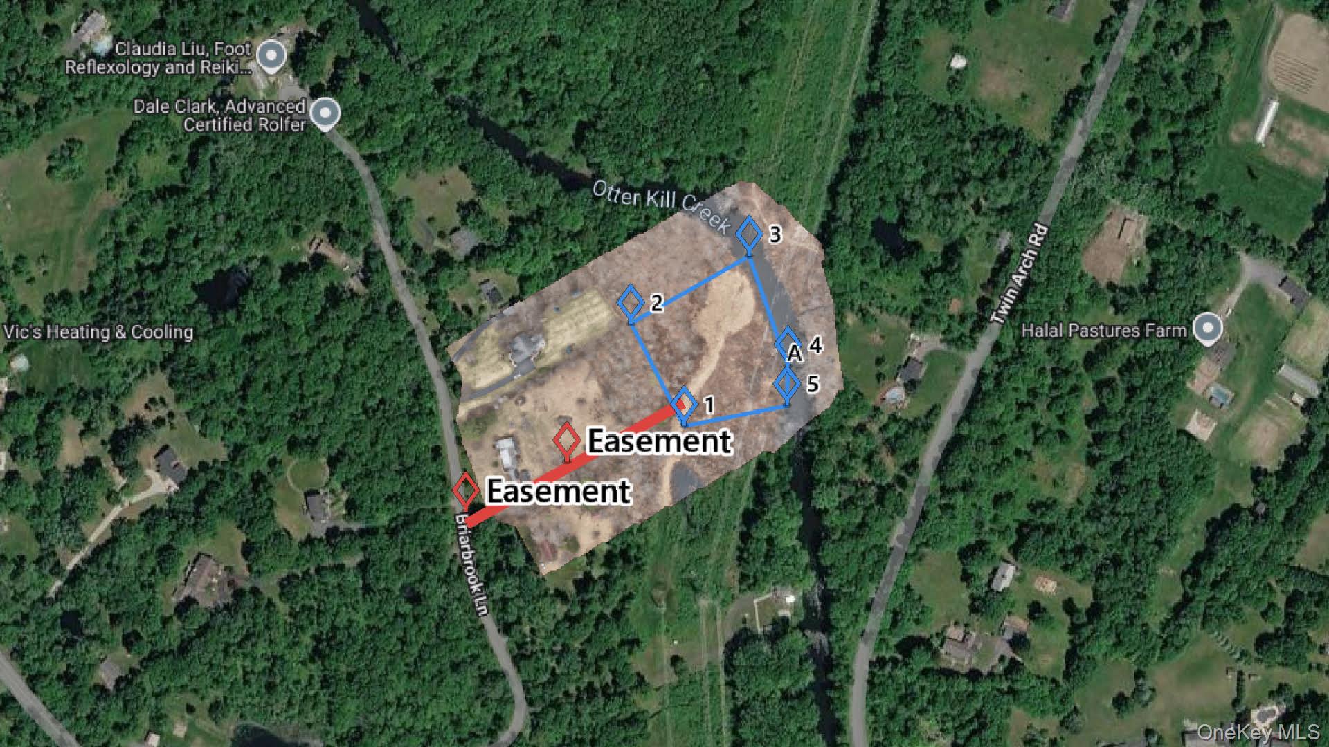 208 Rte Campbell Hall, NY 10916 - Photo 2 of 4 a sign that is in front of flowers