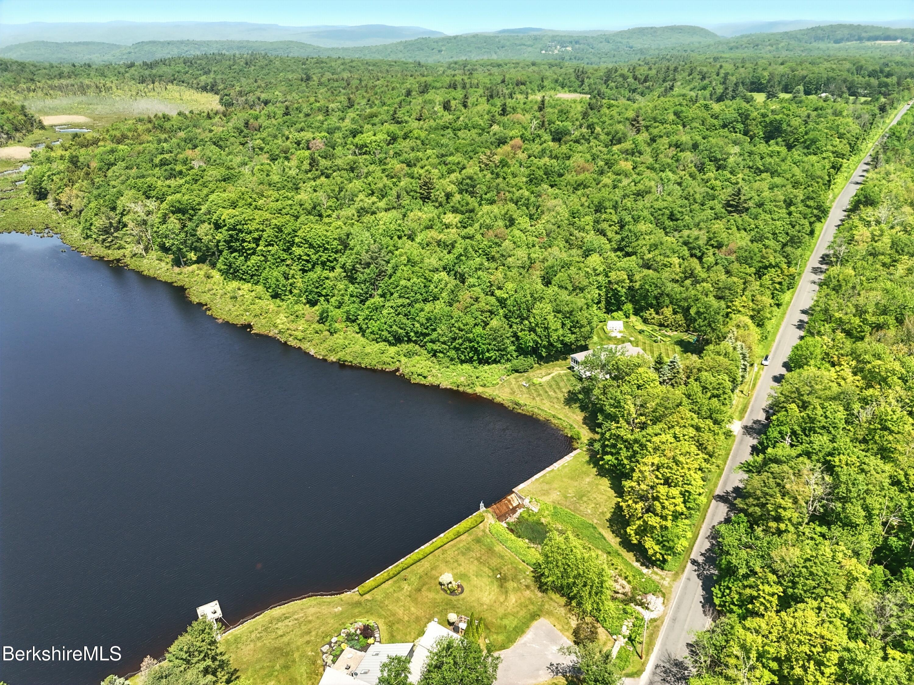 0 West Street Sandisfield, MA 01255 - Photo 7 of 16 a view of a lake from a yard
