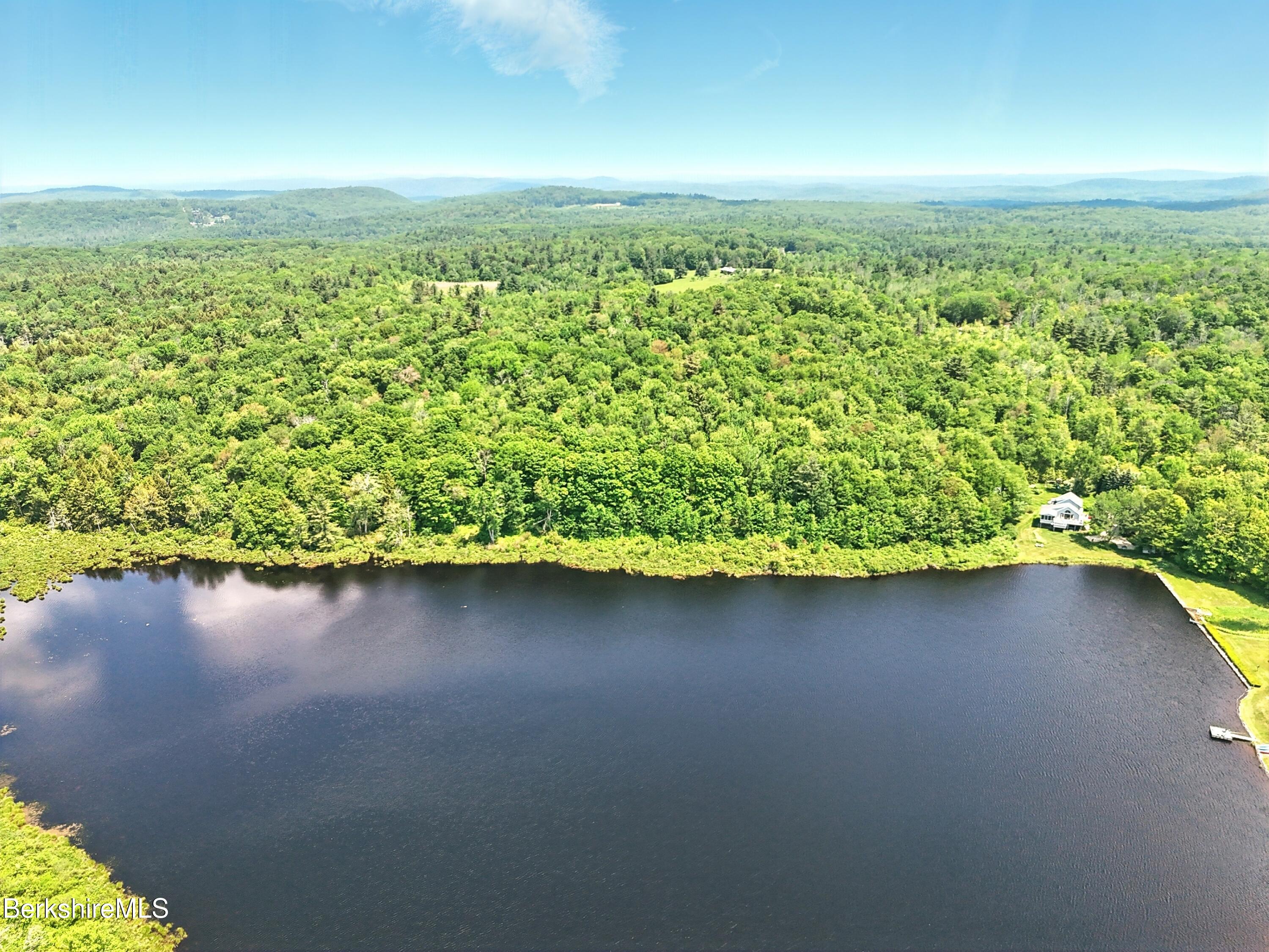 0 West Street Sandisfield, MA 01255 - Photo 10 of 16 a view of a lake with a yard