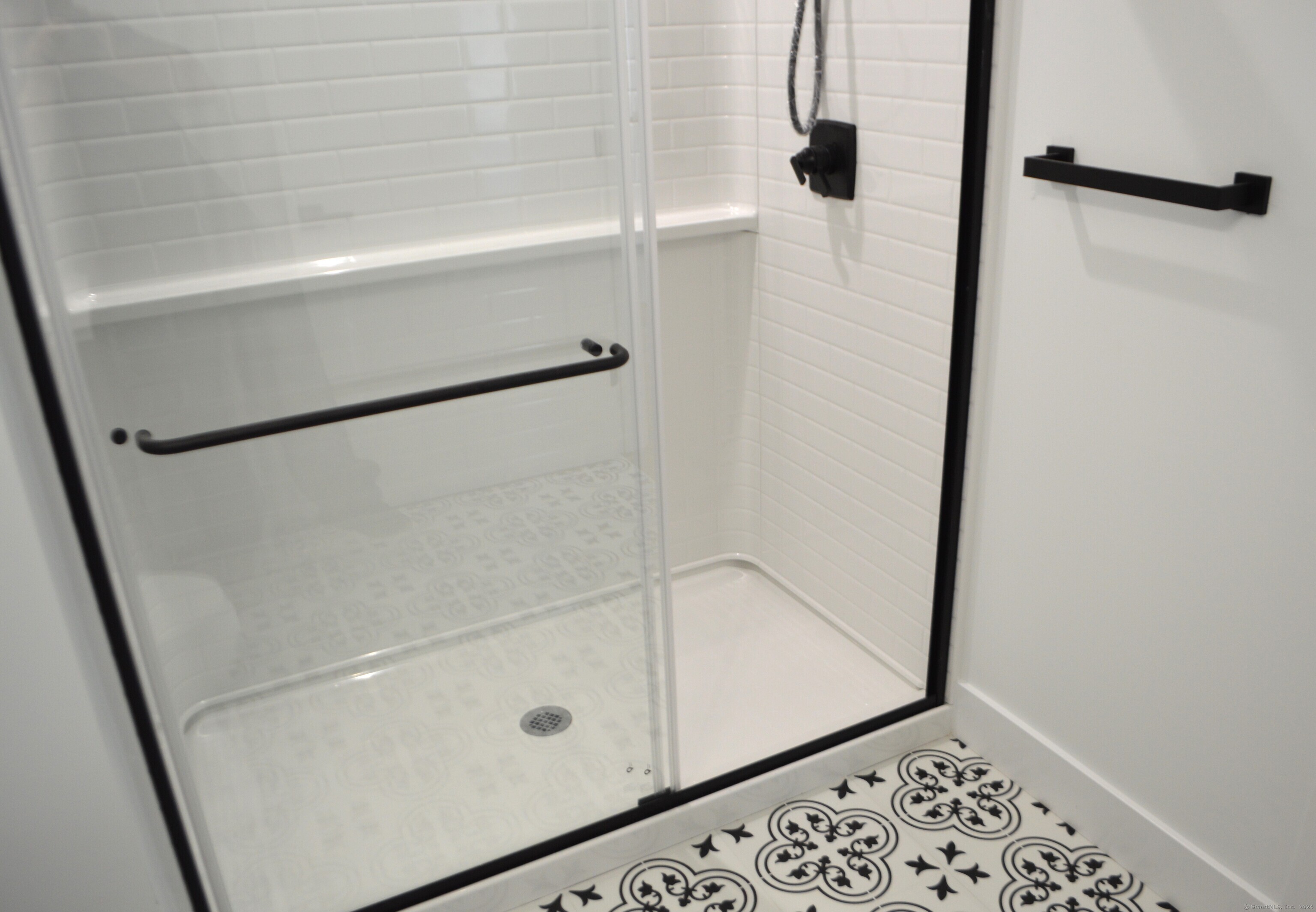 25 Church Street, Unit 301 New Milford, CT 06776 - Photo 13 of 14 a bathroom with a shower