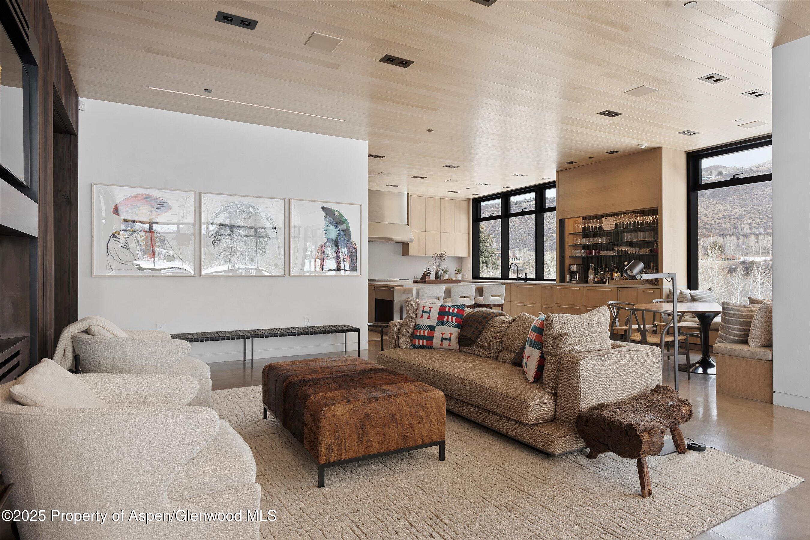 276 Coach Road Aspen, CO 81611 - Photo 14 of 54 a living room with furniture kitchen view and a window