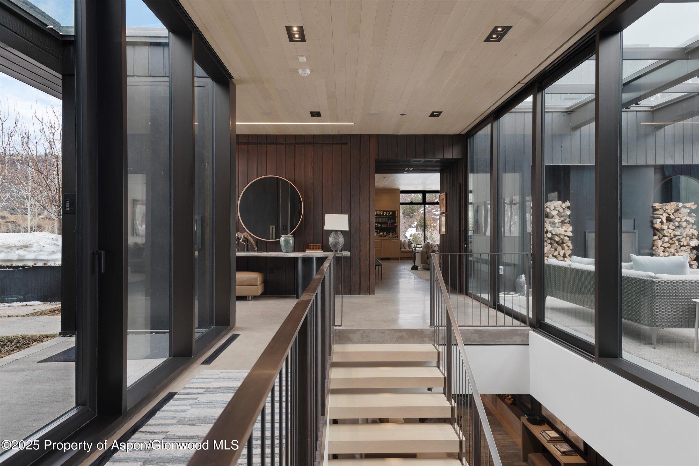 276 Coach Road Aspen, CO 81611 - Photo 17 of 54 a view of entryway and hall with wooden floor