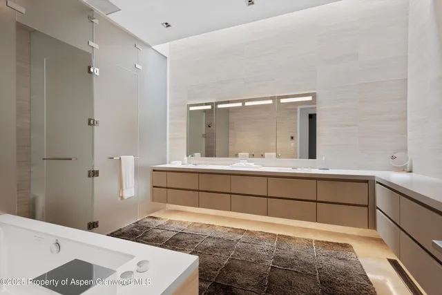 a room with storage and white walls