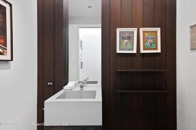 a view of a balcony with table and chairs