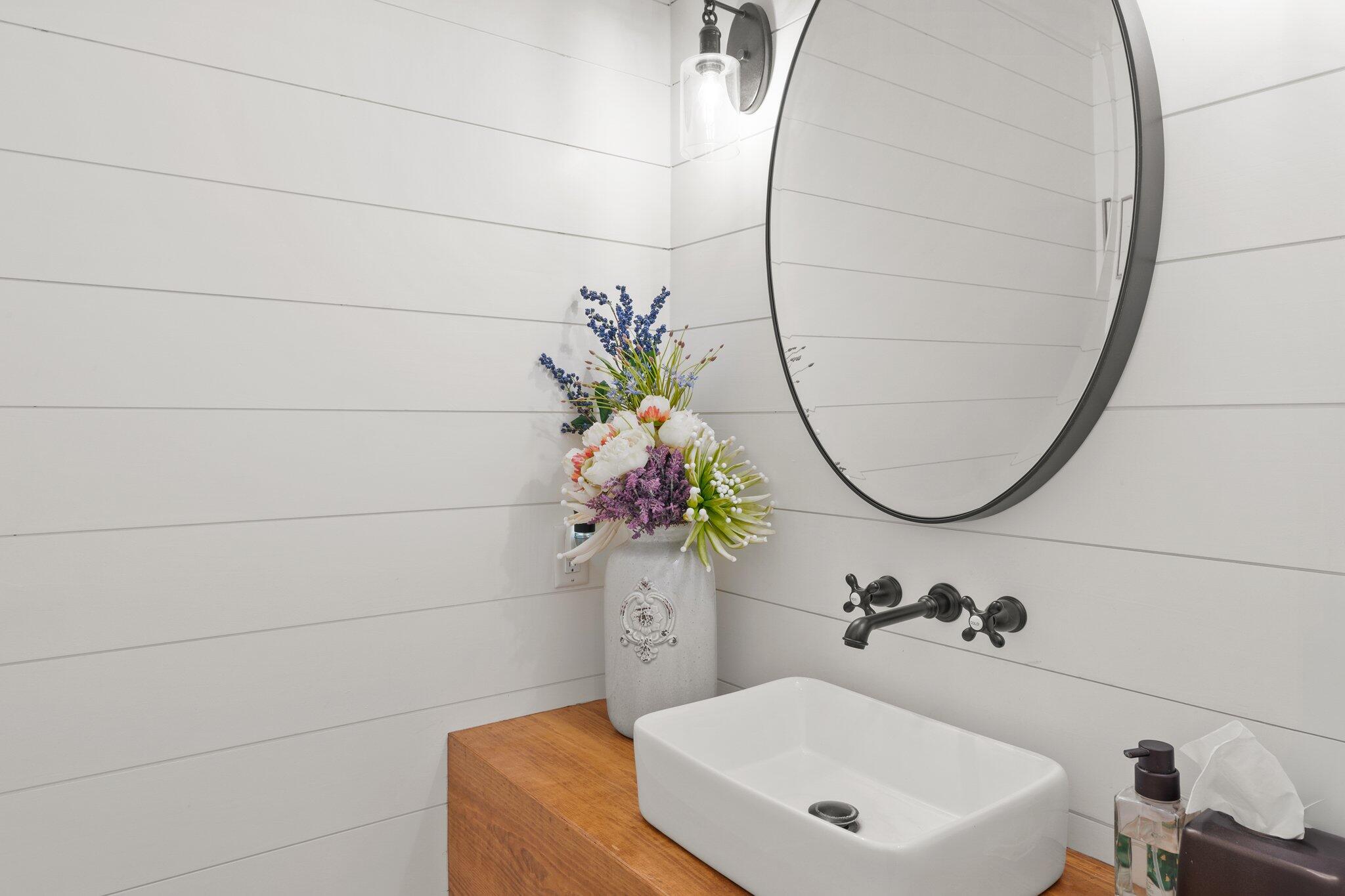 55 Vantage Point Miramar Beach, FL 32550 - Photo 16 of 38 a bathroom with a sink and a mirror