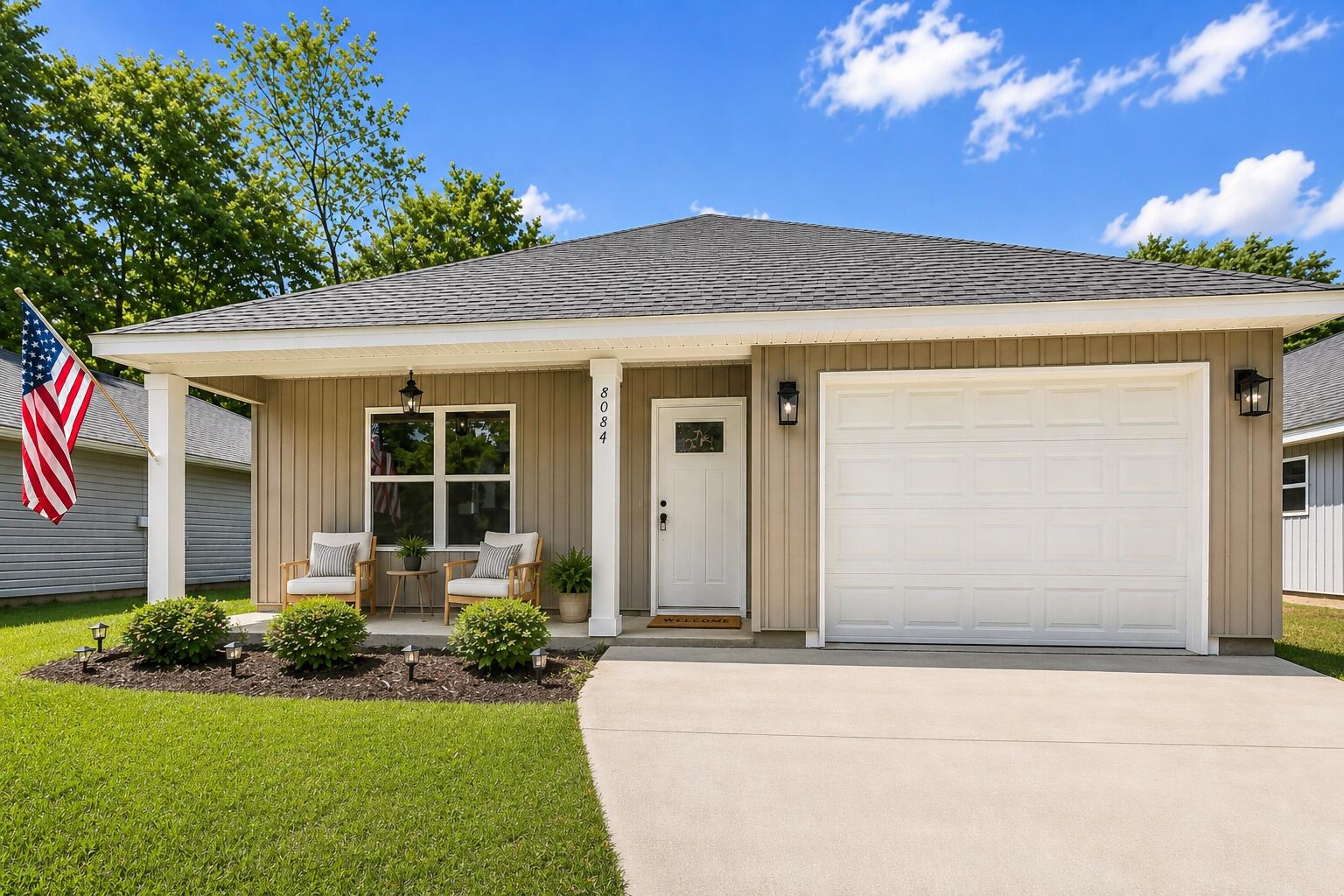 8084 3rd Street Laurel Hill, FL 32567 - Photo 1 of 34 a front view of a house with a yard