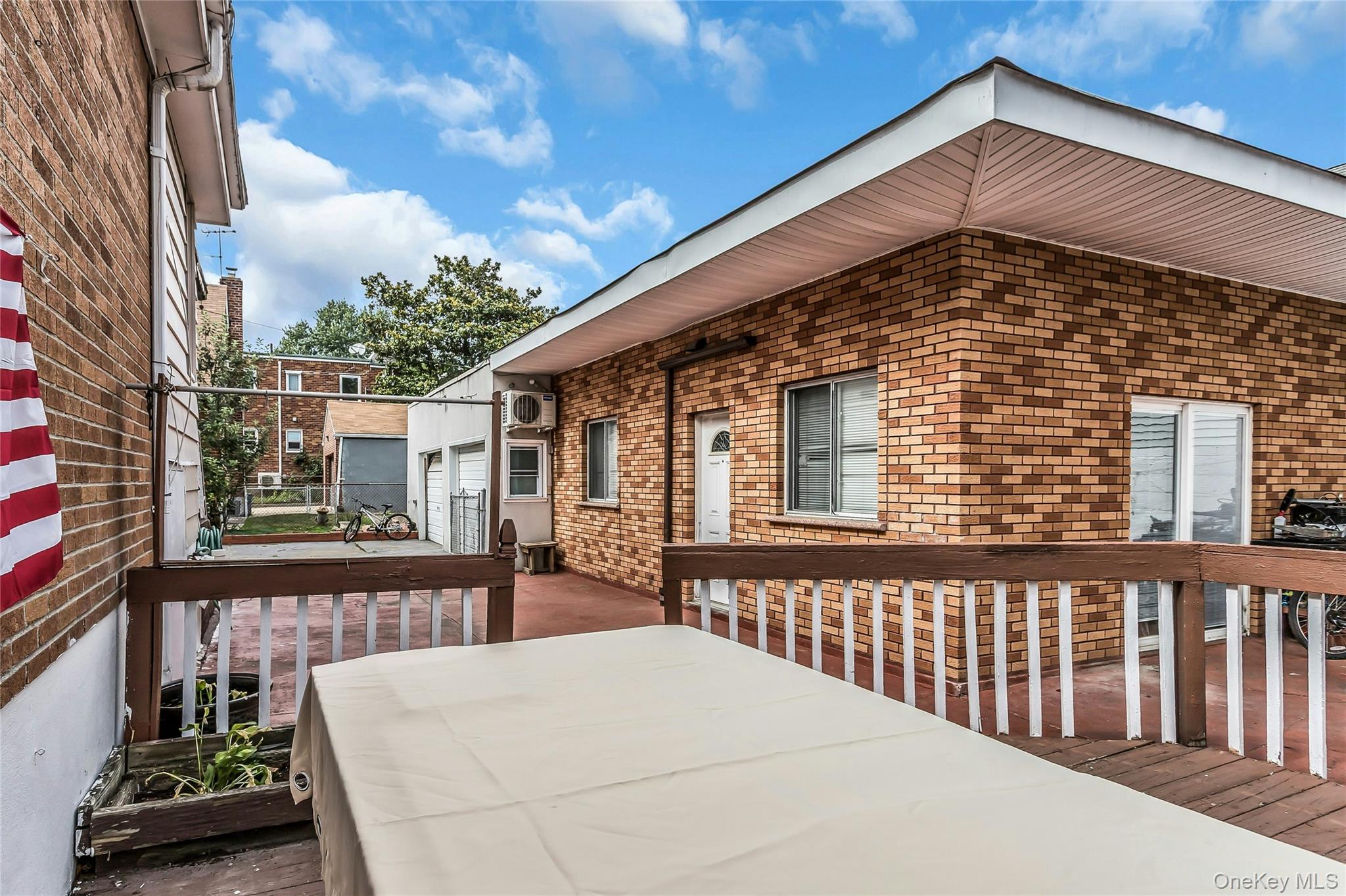 91-15 79th Street Queens, NY 11421 - Photo 10 of 12 a front view of a house