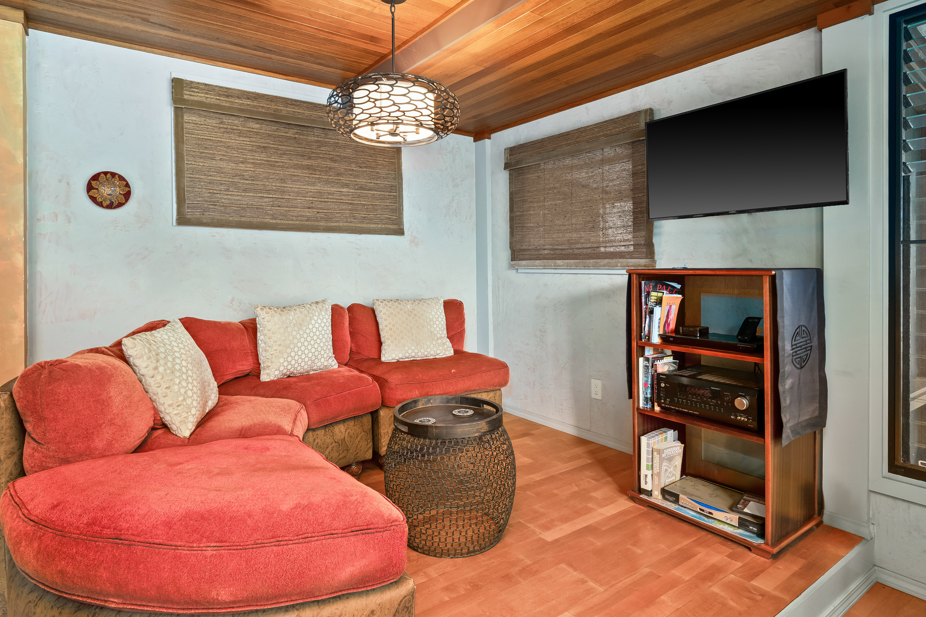 5728 Olohena Road Kapaa, HI 96746 - Photo 23 of 30 a living room with furniture and a flat screen tv