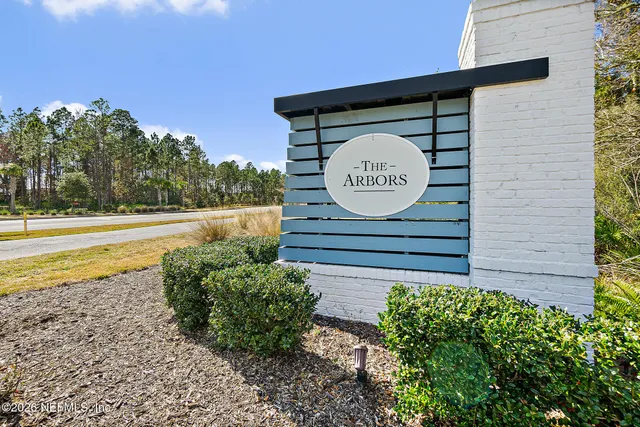 a view of a door of a house with a yard