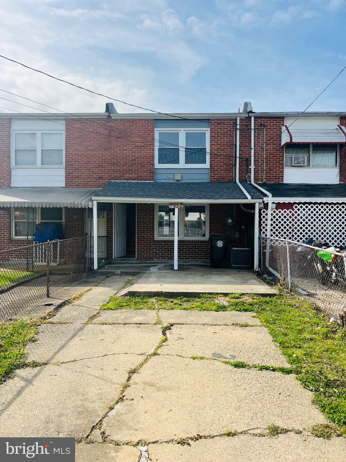 7932 Wynbrook Road Baltimore, MD 21224 - Photo 13 of 13 a view of a house with a swimming pool