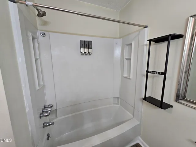 a bathroom with a bathtub