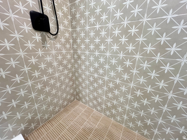 812 East Bates Cyn Road Tooele, UT 84074 - Photo 84 of 144 Shower enclosure featuring patterned wall tiles and a slatted shower pan